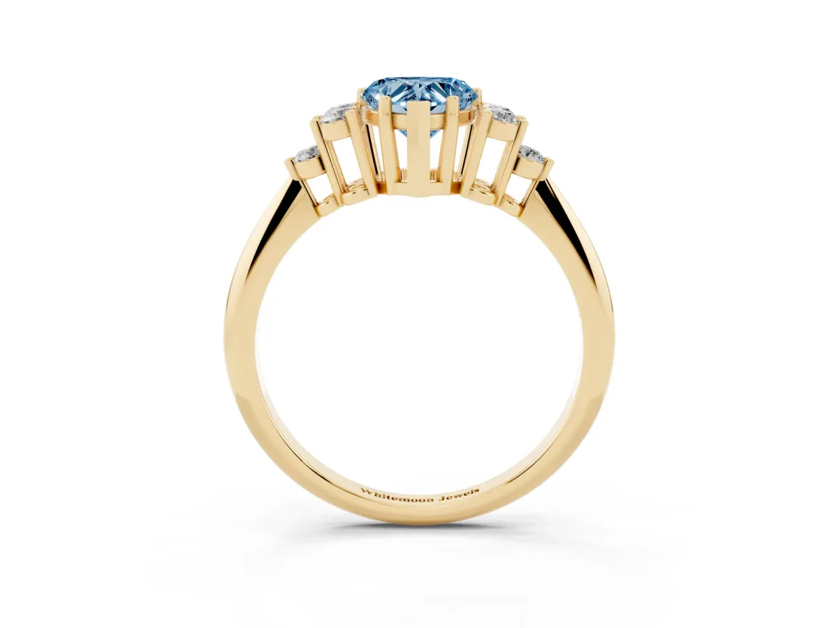 Fancy Blue Heart Cut Cut Diamond Cluster Ring with Solitaire Band and Four-Prong Setting Yellow gold