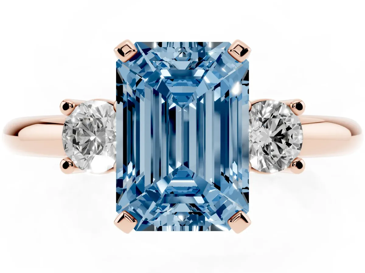 Fancy Blue Three-Stone Emerald Cut Cut Diamond Solitaire with Prong Setting and Classic Band Rose gold