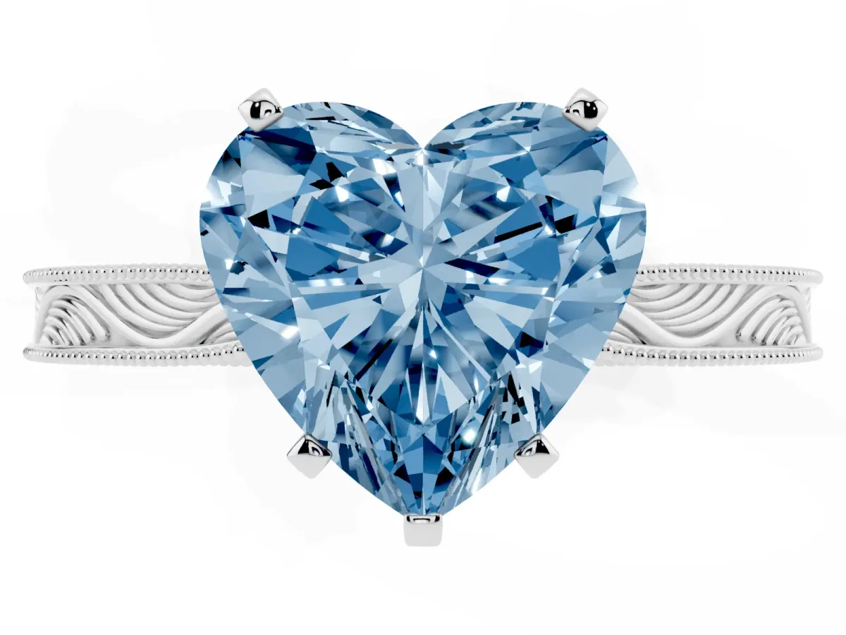 Fancy Blue Heart Cut Solitaire Milgrain Engraved Band with Four-Prong Setting Platinum