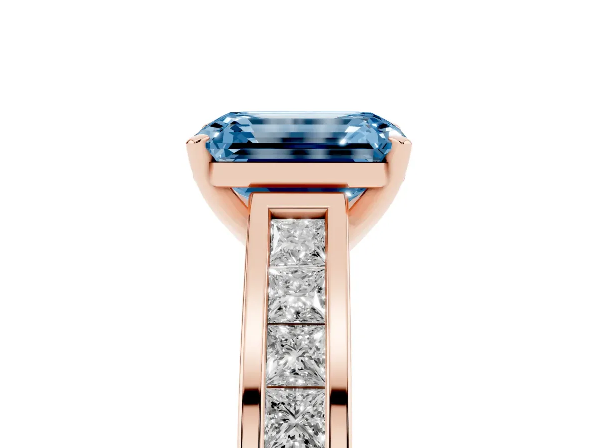 Fancy Blue Emerald Cut Solitaire Diamond Ring with Channel-Set Band and Four-Prong Setting Rose gold