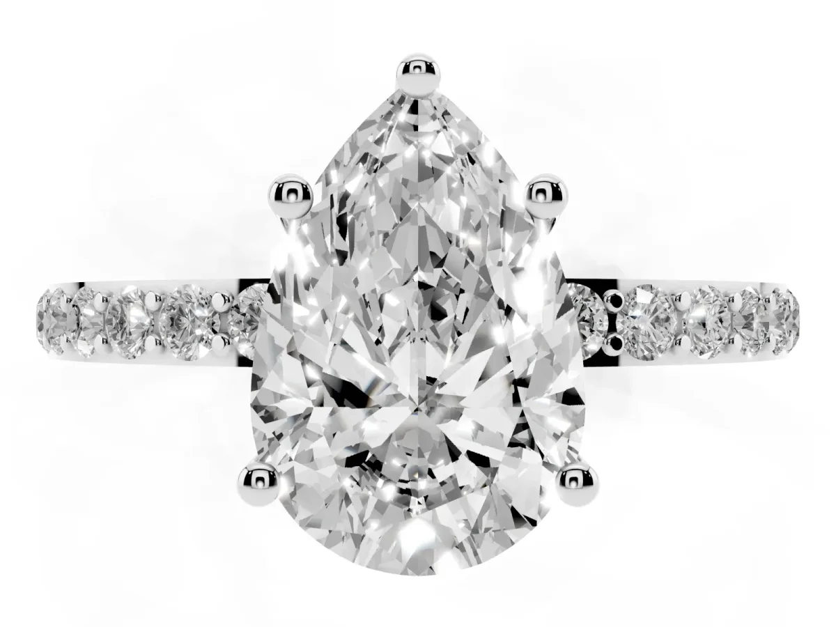 Pear Cut Diamond Solitaire Ring with Round Pavé Shoulders and Prong Setting Platinum