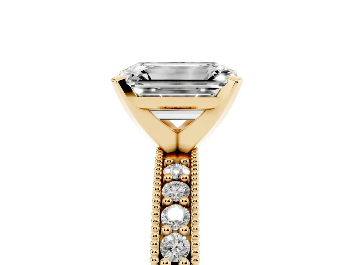 Emerald Cut Diamond Milgrain Pavé Engagement Ring with Four-Prong Setting Yellow gold