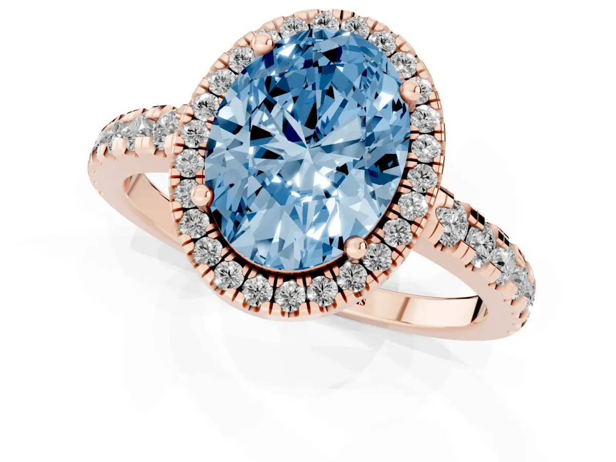 Fancy Blue Oval Cut Diamond Halo Ring with Pavé Band and Four-Prong Setting Rose gold