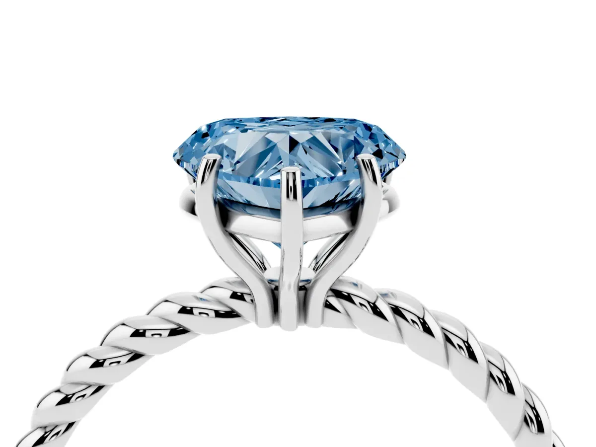 Fancy Blue Heart Cut Solitaire Twist Band Ring with Four-Prong Setting Platinum