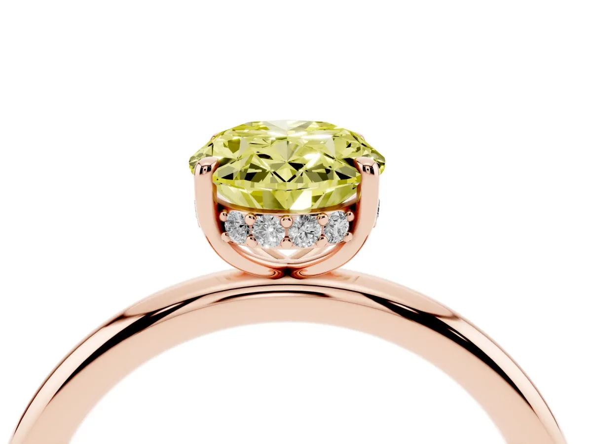 Fancy Yellow Oval Cut Diamond Solitaire Ring with Thin Band and Four-Prong Setting Rose gold
