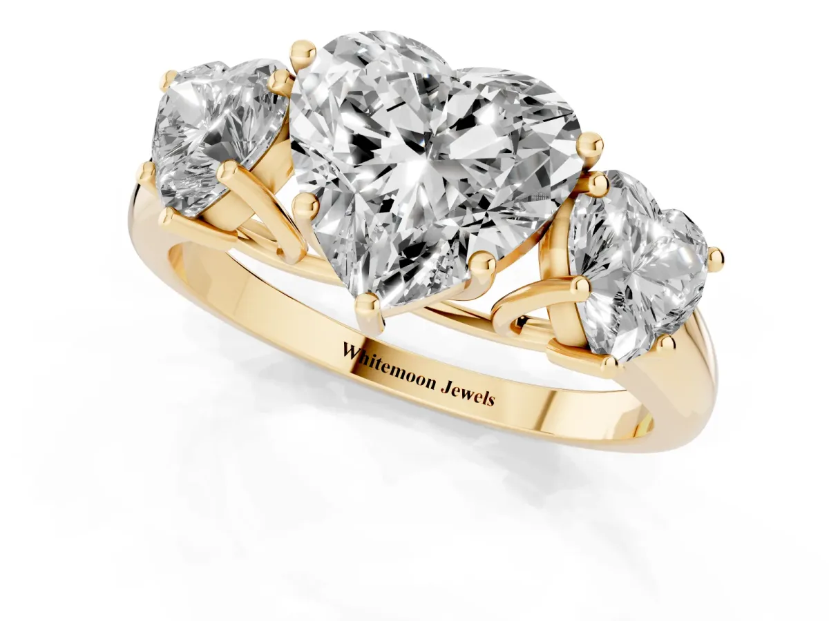 Three-Stone Heart Cut Diamond Engagement Ring with Prong Setting Yellow gold