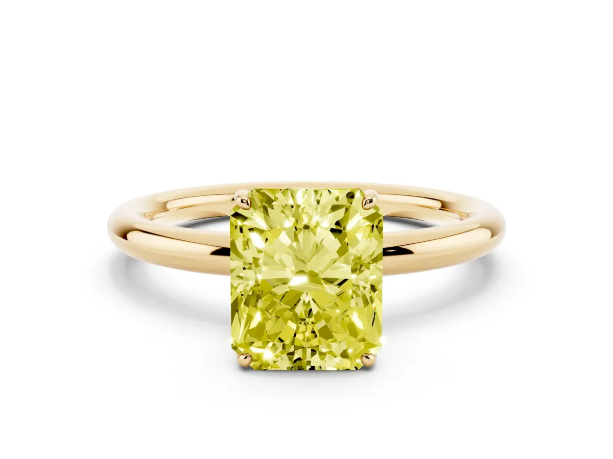 Fancy Yellow Radiant Cut Solitaire Diamond Ring with Four-Prong Setting on a Plain Band Yellow gold