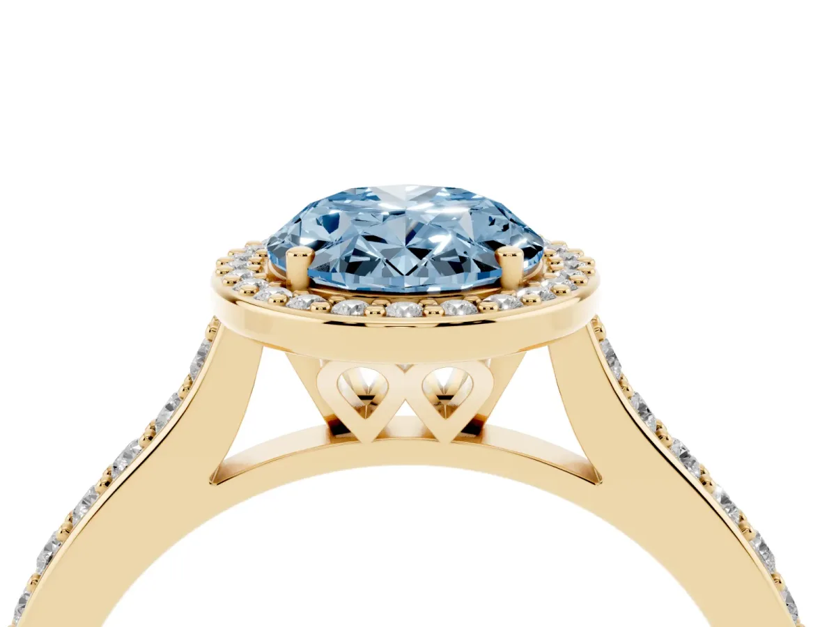 Fancy Blue Oval Cut Diamond Halo Engagement Ring with Round Pavé Shoulders and Prong Setting Yellow gold