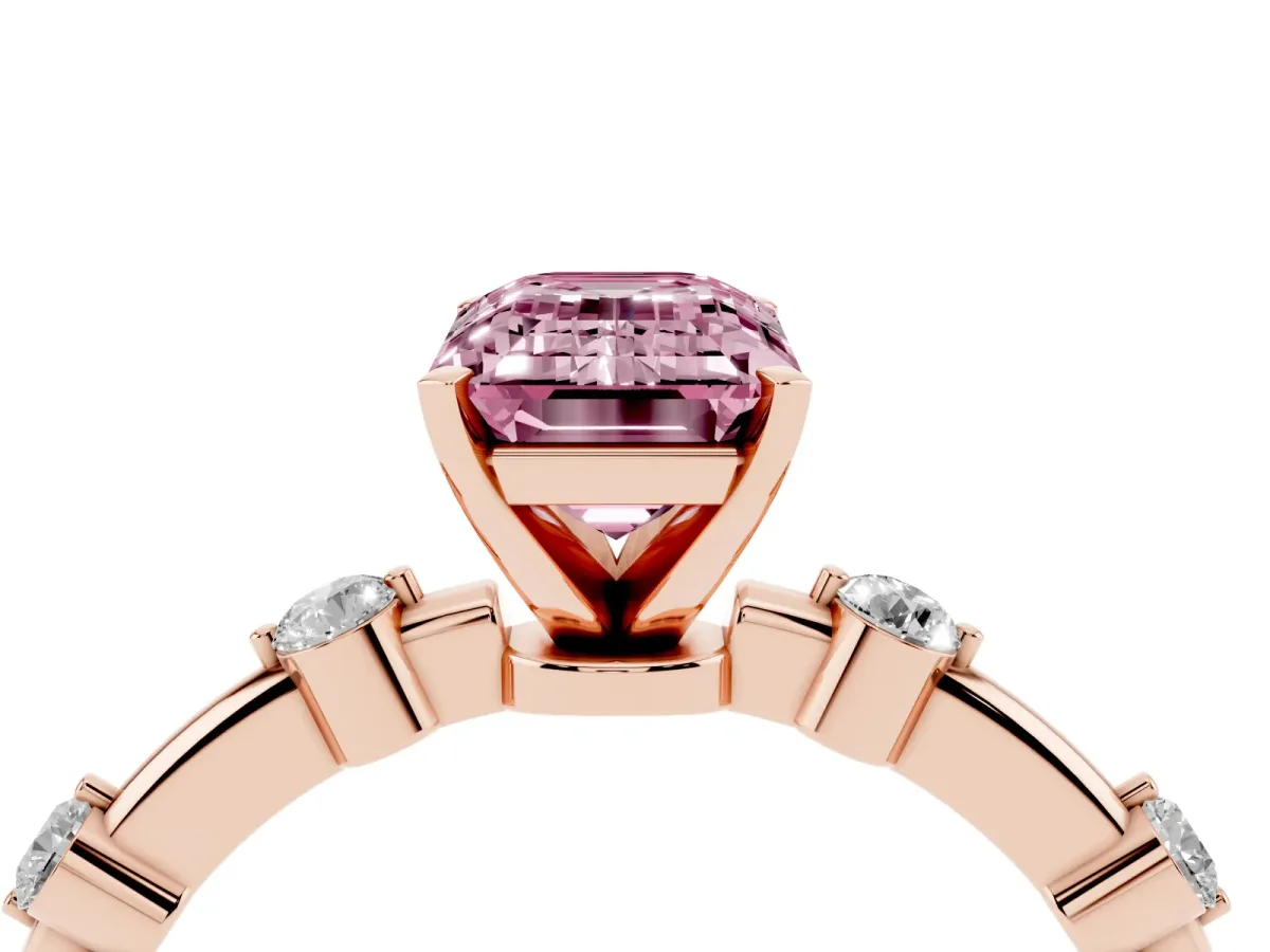 Fancy Pink Emerald Cut Solitaire Diamond Ring with Bezel Set Side Stones and Prong Setting Rose gold