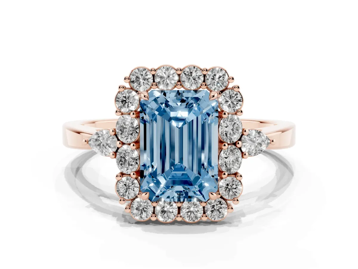 Fancy Blue Emerald Cut Diamond Halo Ring with Pear Side Stones and Prong Setting Rose gold