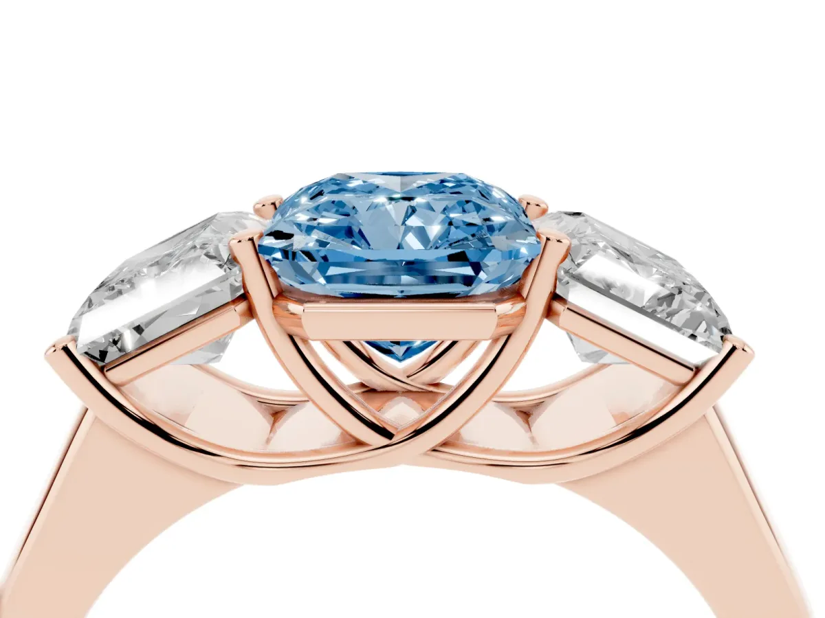 Fancy Blue Radiant Cut Three-Stone Diamond Ring with Prong Setting on a Classic Band Rose gold