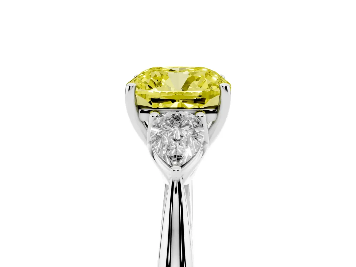 Fancy Yellow Three-Stone Cushion Cut Diamond Ring with Pear Side Stones in Four-Prong Setting Silver