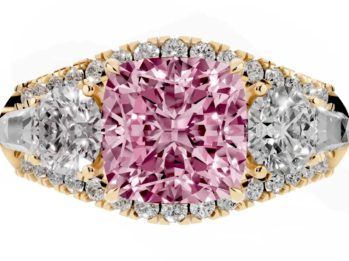Fancy Pink Three-Stone Cushion Cut Diamond Engagement Ring with Pave Band and Prong Setting Yellow gold