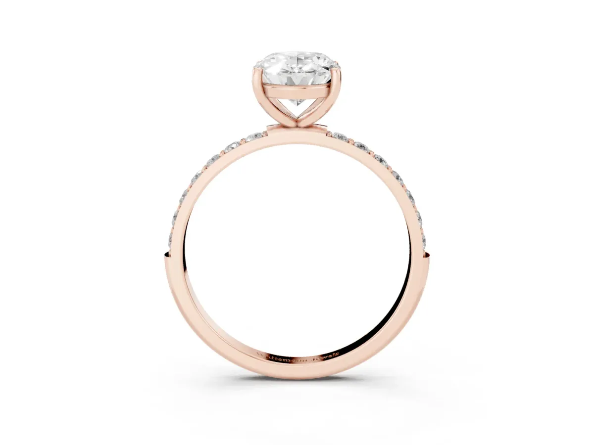 Oval Cut Diamond Solitaire Ring with Round Pavé Shoulders and Prong Setting Rose gold