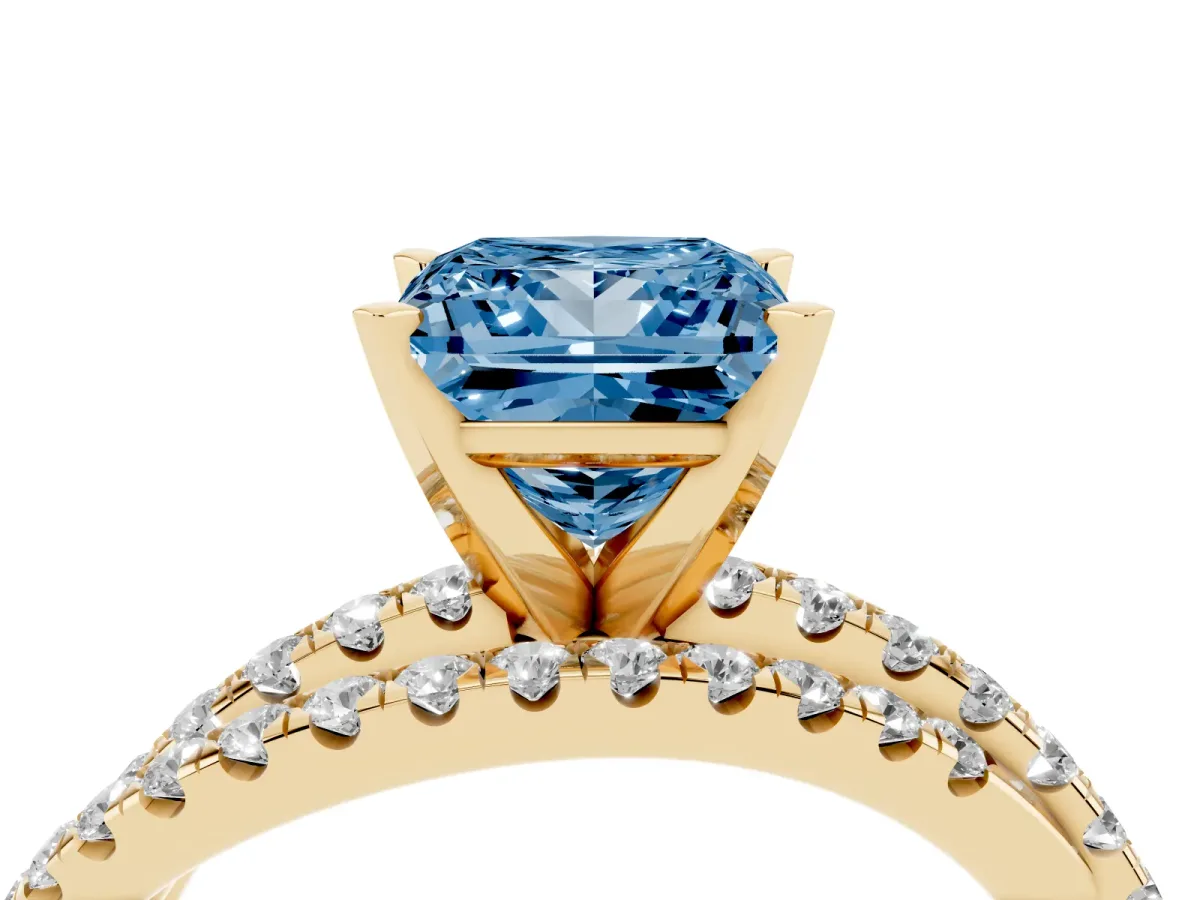 Fancy Blue Princess Cut Solitaire Twist Band with Pavé Setting and Four-Prong Setting Yellow gold