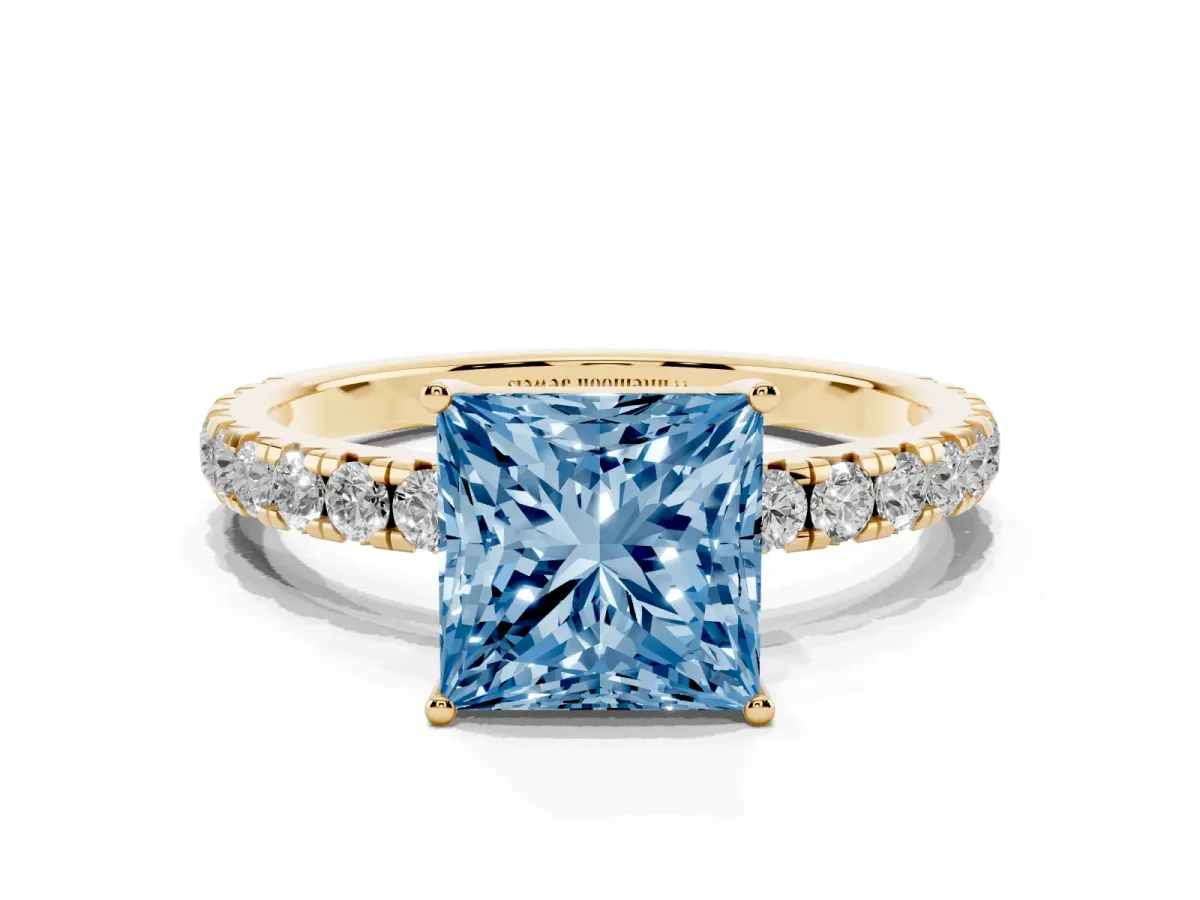 Fancy Blue Princess Cut Diamond Pavé Solitaire Engagement Ring with Four-Prong Setting Yellow gold