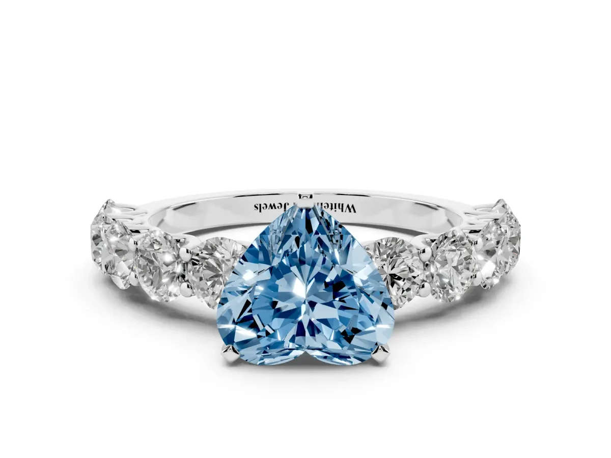 Fancy Blue Heart Cut Diamond Prong Setting with Side Stones on a Pave Band Silver