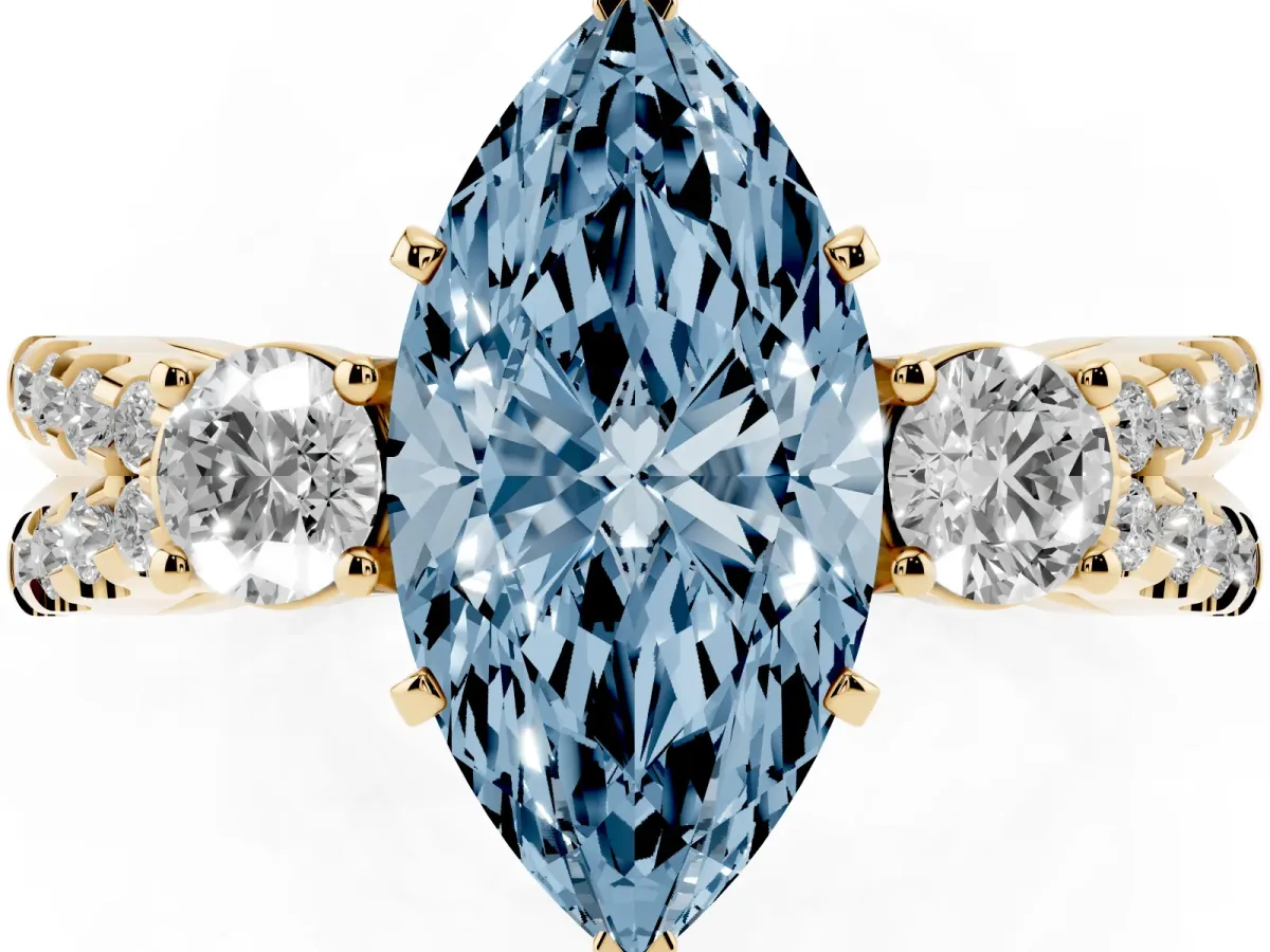 Fancy Blue Marquise Cut Diamond Three-Stone Ring with Pavé Split Shank and Four-Prong Setting Yellow gold
