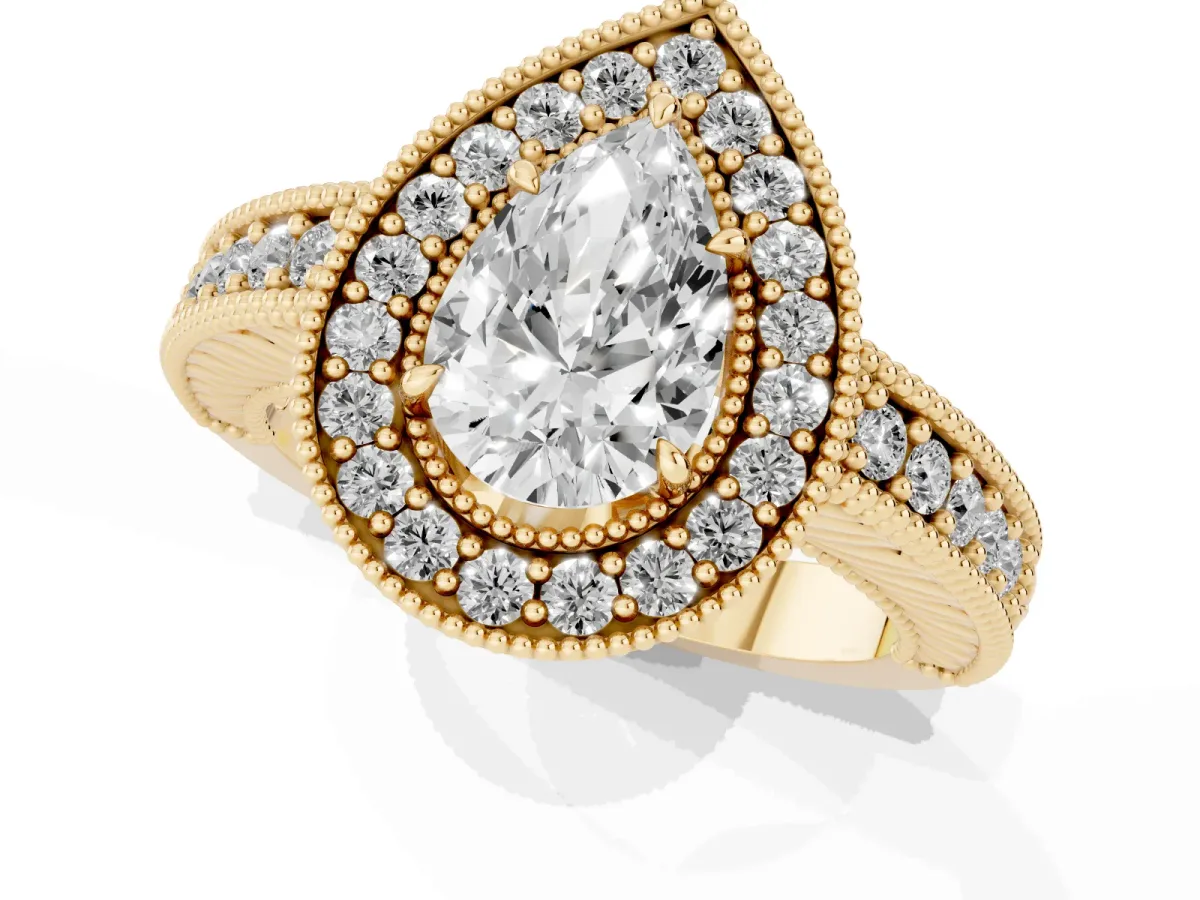 Pear Cut Cut Halo Diamond Ring with Pavé Band and Four-Prong Setting Yellow gold