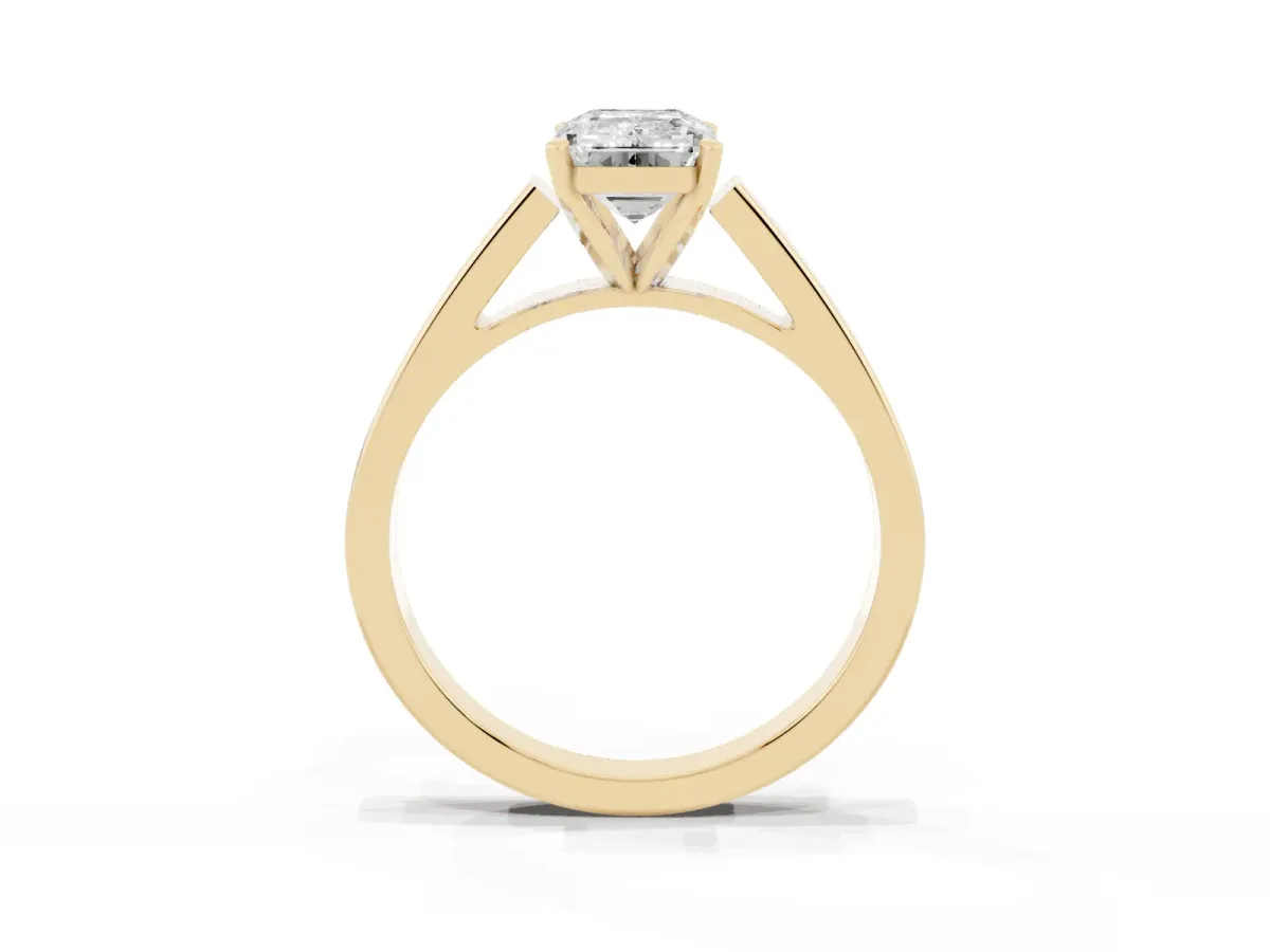Emerald Cut Solitaire Engagement Ring with Four-Prong Setting and Tapered Band Yellow gold