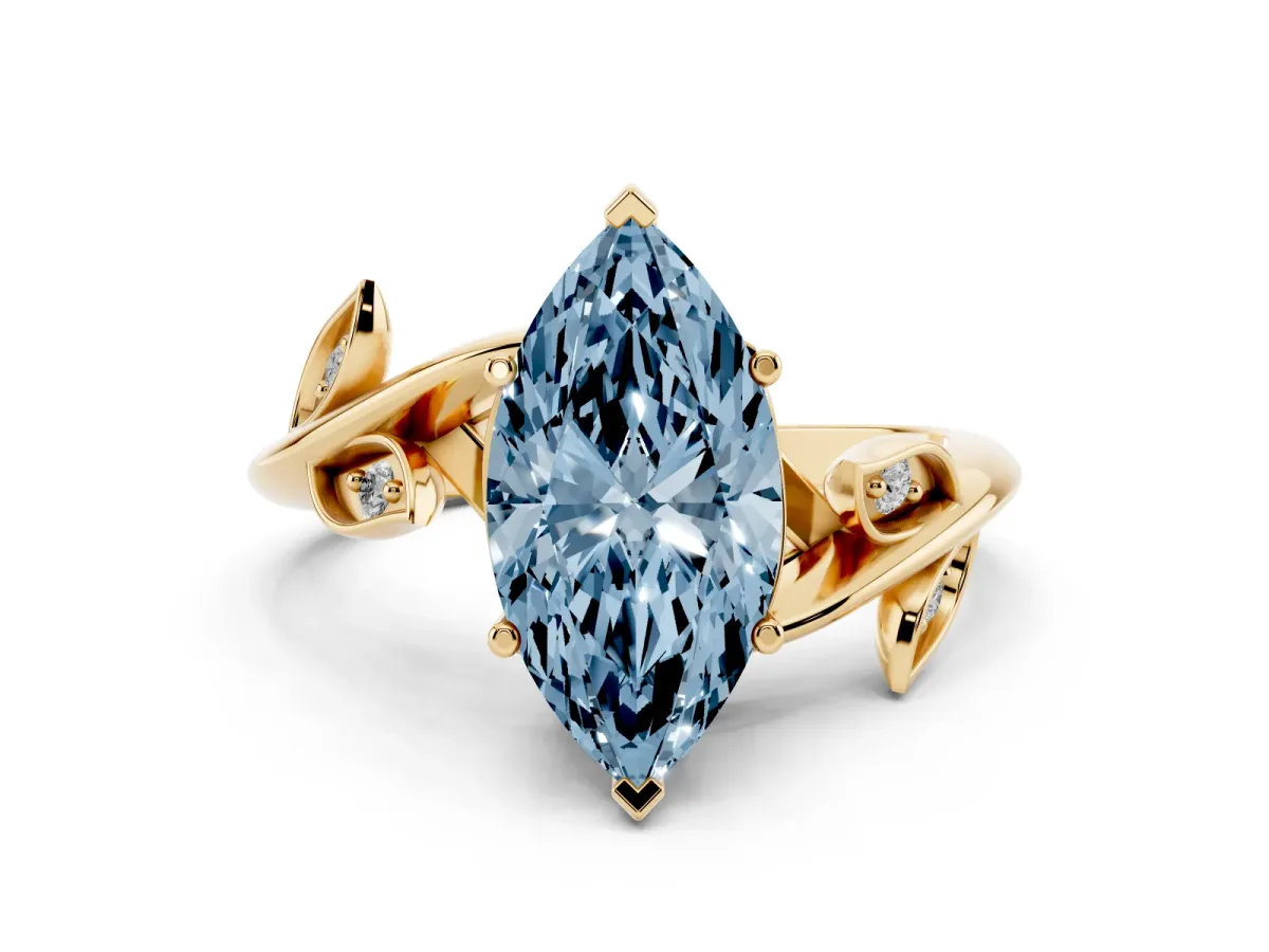 Fancy Blue Marquise Cut Solitaire Twist Engagement Ring with Leaf Accents and Prong Setting Yellow gold
