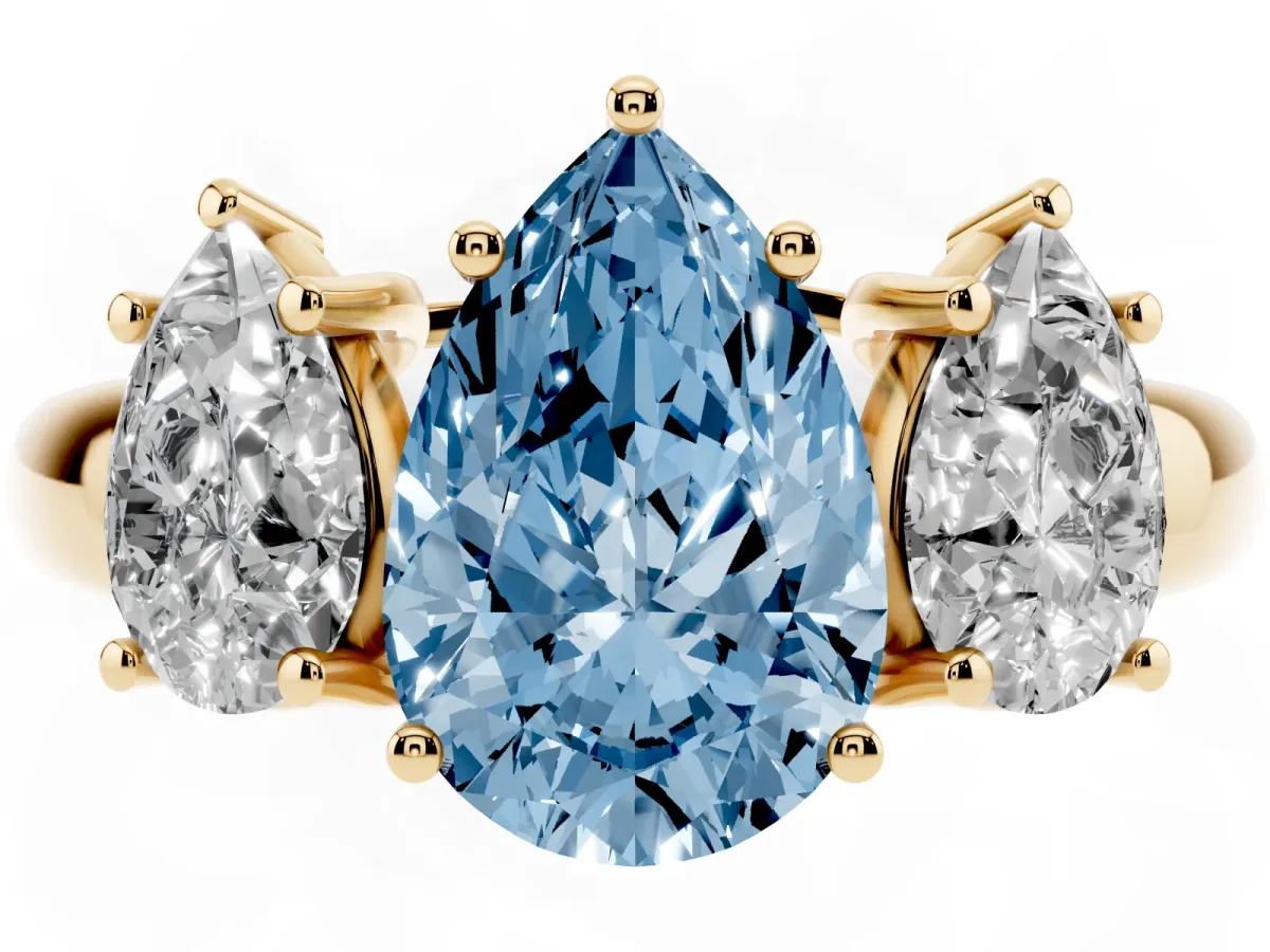 Fancy Blue Three-Stone Pear Cut Diamond Engagement Ring with Prong Setting Yellow gold