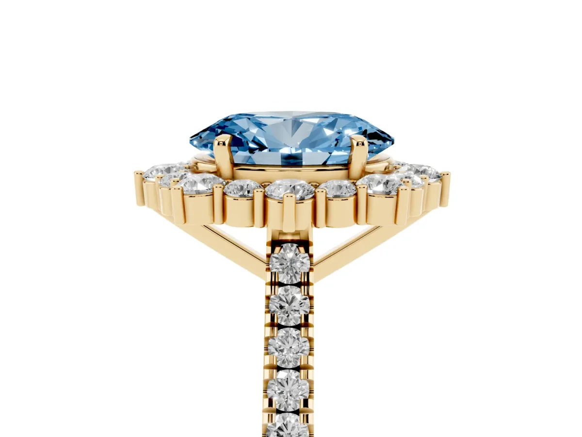 Fancy Blue Oval Cut Halo Diamond Ring with Pavé Band and Prong Setting Yellow gold