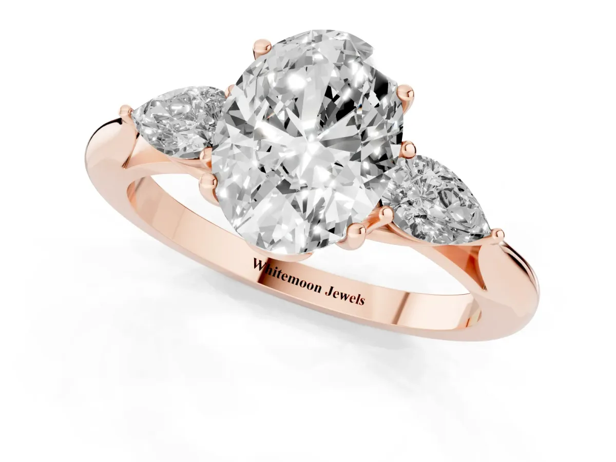 Three-Stone Oval Cut Brilliant Diamond Solitaire Ring with Tapered Band and Four-Prong Setting Rose gold