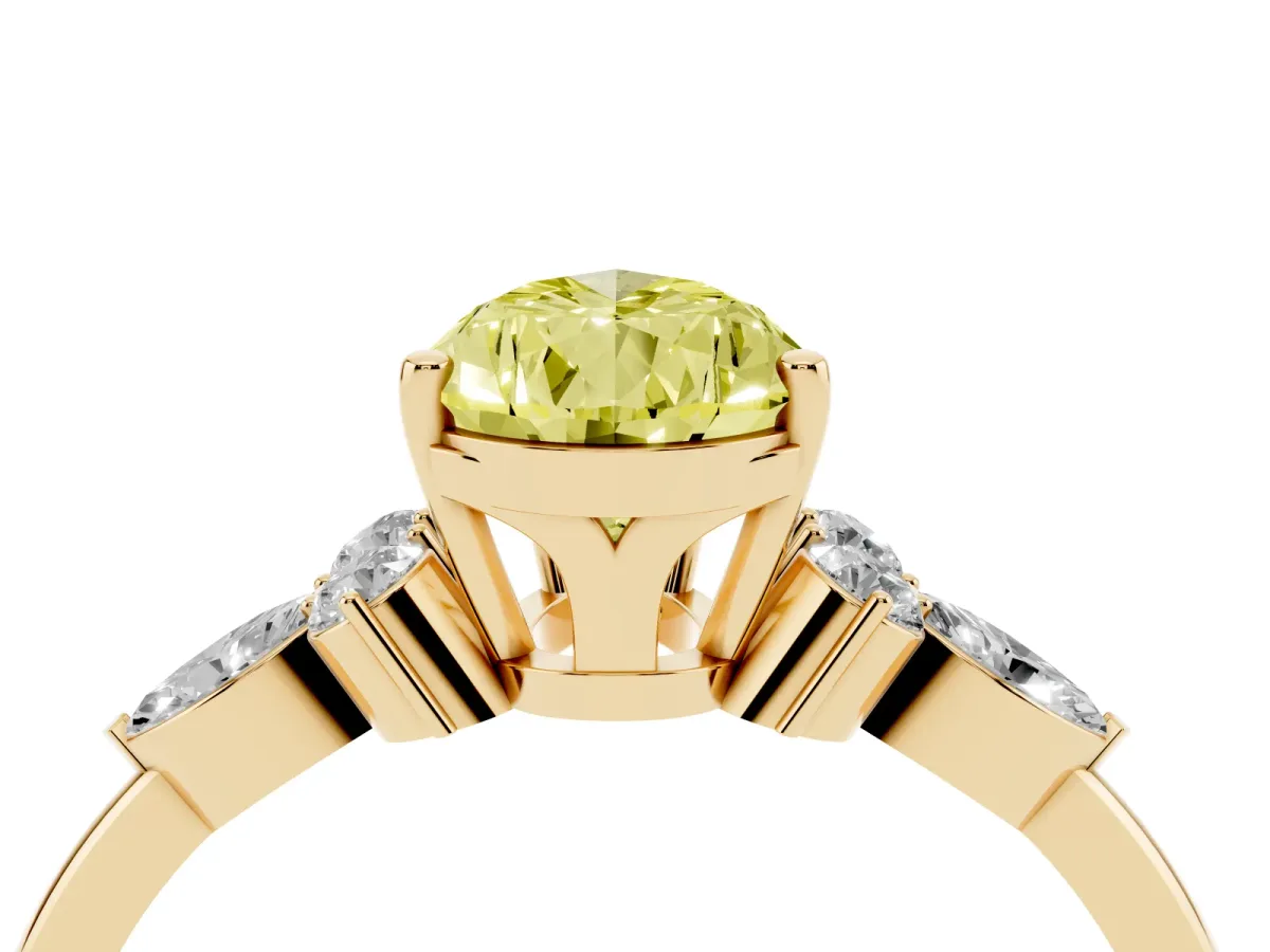 Fancy Yellow Pear Cut Brilliant Diamond Solitaire Ring with Pear Side Stones and Four-Prong Setting Yellow gold