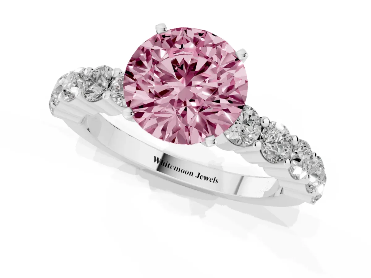 Fancy Pink Round Cut Diamond Solitaire Ring with Shared Prong Round Side Stones Platinum