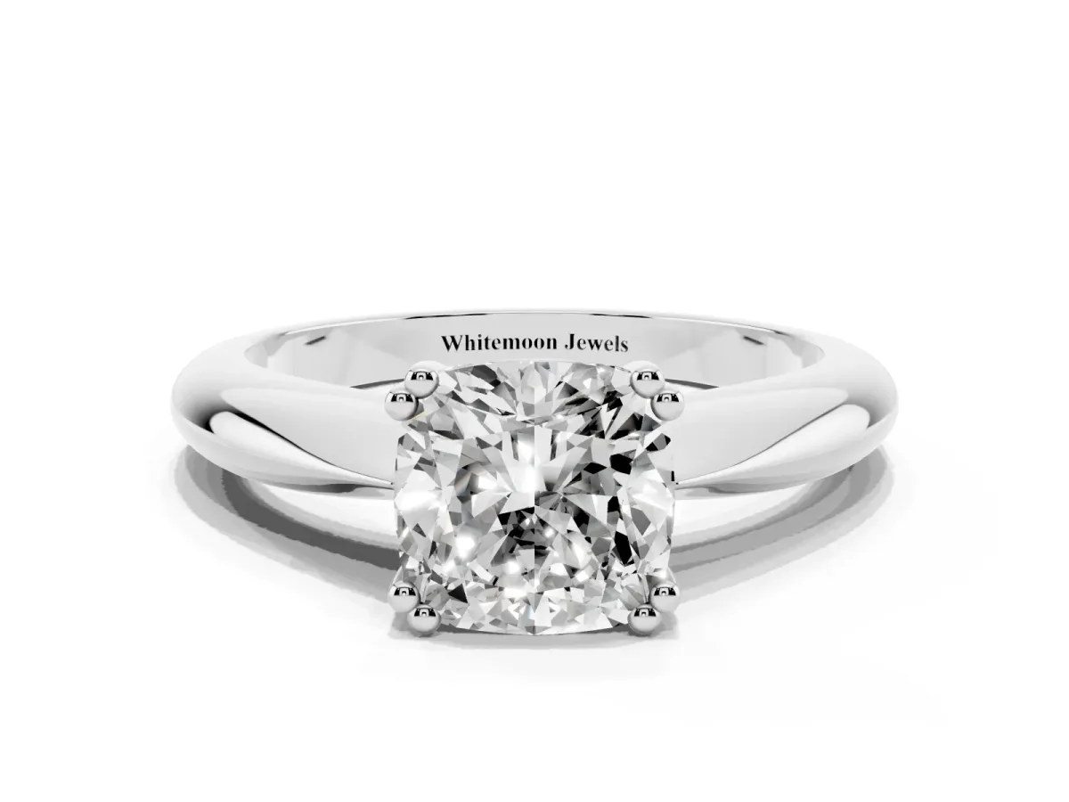 Cushion Cut Cut Solitaire Engagement Ring with Tapered Band and Four-Prong Setting Platinum