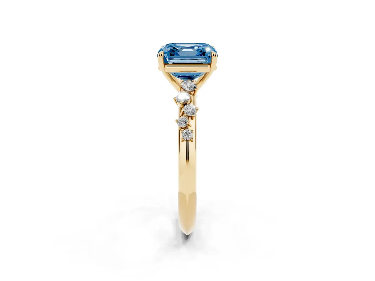 Fancy Blue Asscher Cut Diamond Cluster Side Stone Solitaire Ring with Prong Setting Yellow gold