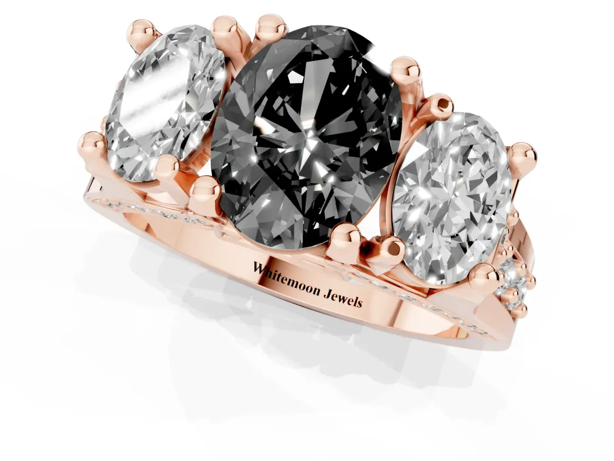 Fancy Black Oval Cut Diamond Three-Stone Ring with Channel Set Band and Four-Prong Setting Rose gold