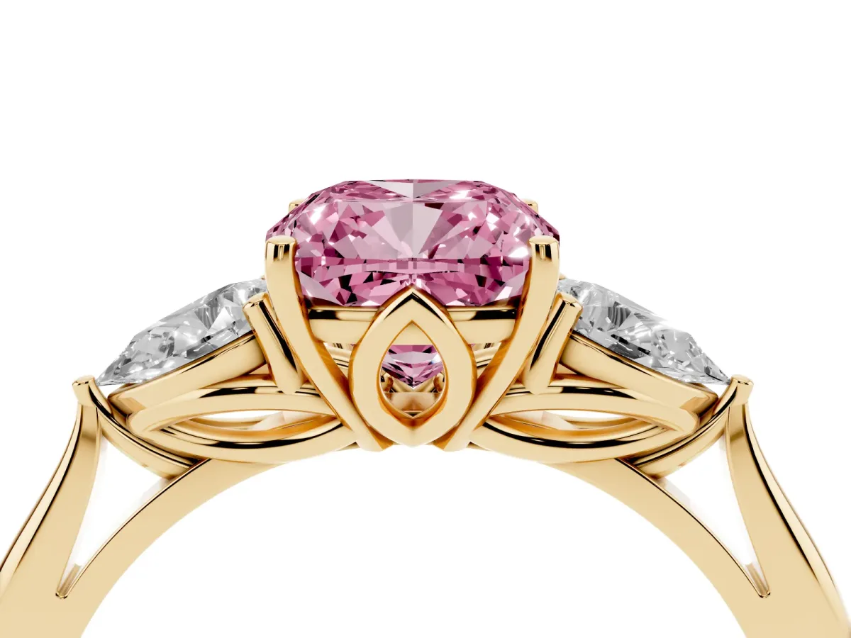 Fancy Pink Cushion Cut Diamond Three-Stone Ring with Pear Side Stones and Prong Setting Yellow gold
