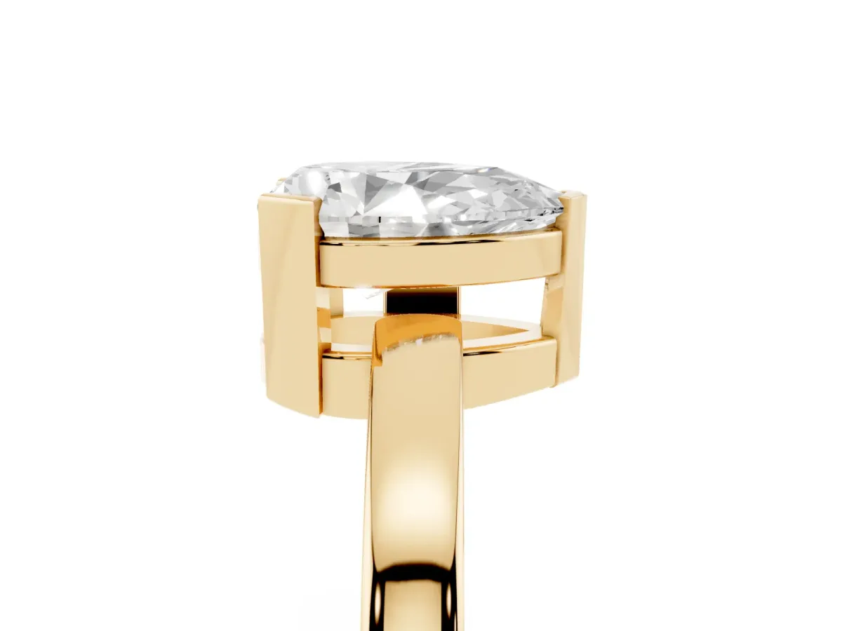 Pear Cut Cut Solitaire Ring with Four-Prong Setting and Classic Band Yellow gold