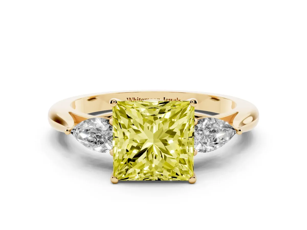 Fancy Yellow Three-Stone Princess Cut Diamond Ring with Pear Side Stones in Four-Prong Setting Yellow gold