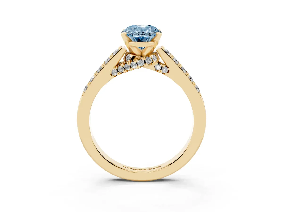 Fancy Blue Oval Cut Diamond Solitaire Ring with Crossover Gallery and Round Pavé Band Yellow gold
