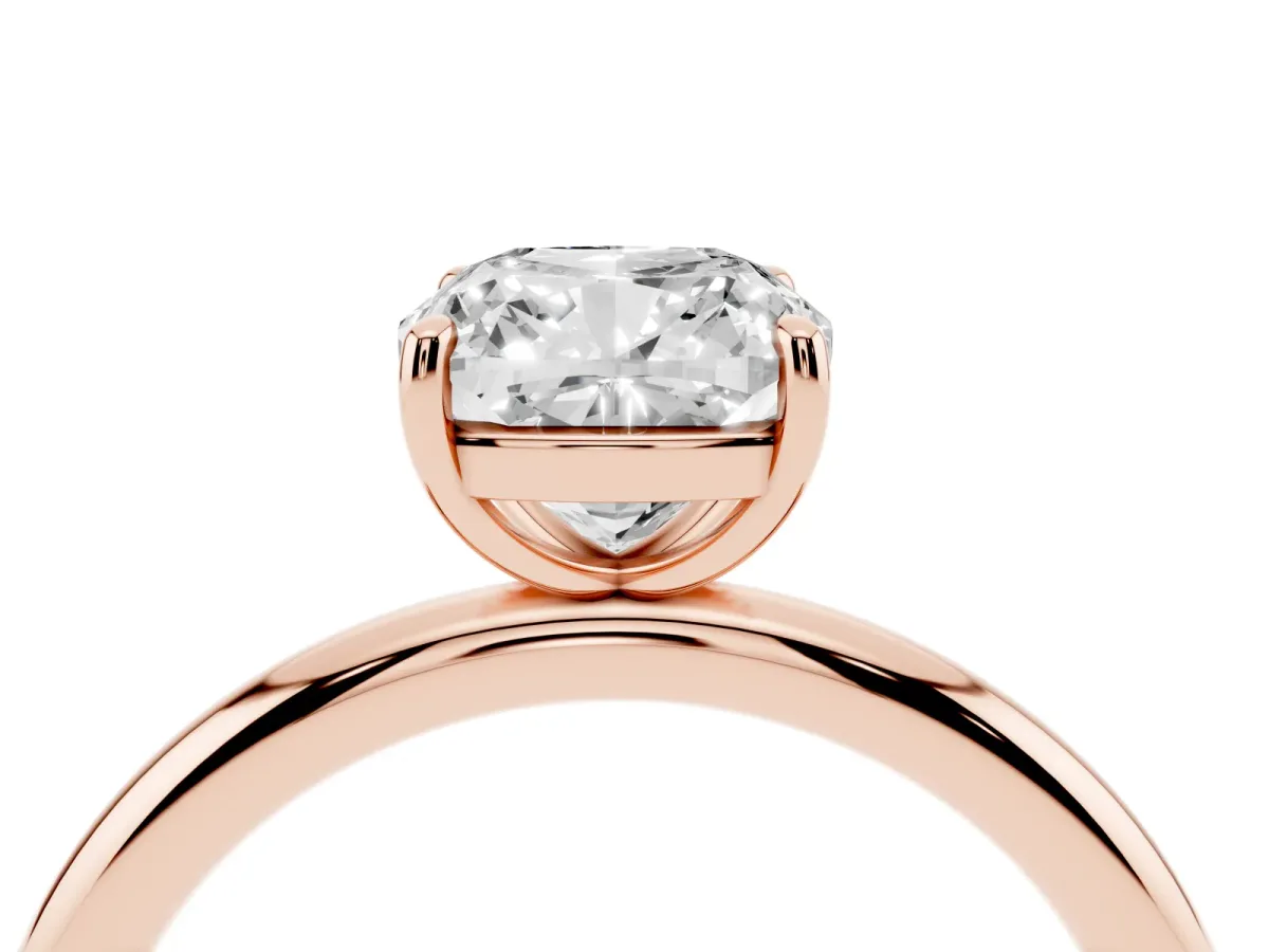 Cushion Cut Solitaire Diamond Ring with Four-Prong Setting on a Plain Band Rose gold