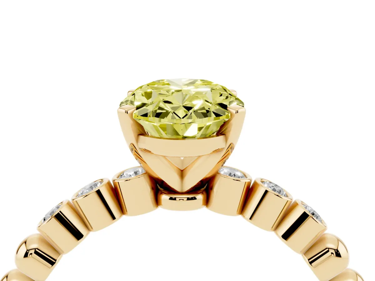 Fancy Yellow Oval Cut Solitaire Bezel Accent Diamond Engagement Ring with Beaded Band and Four-Prong Setting Yellow gold