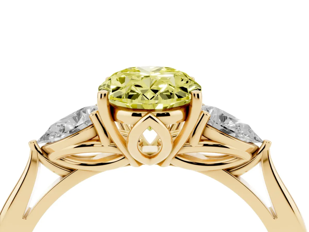 Fancy Yellow Three-Stone Oval Cut Brilliant Diamond Solitaire Ring with Tapered Band and Four-Prong Setting Yellow gold