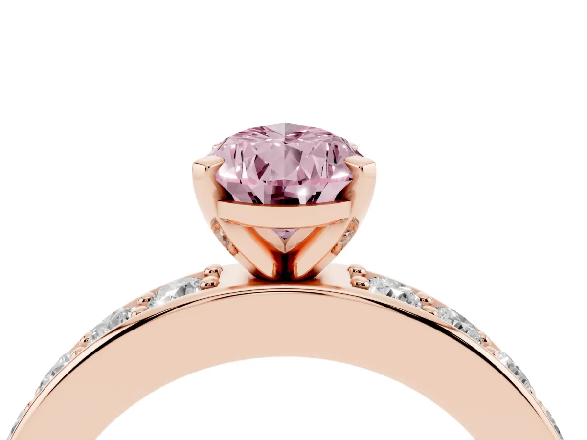 Fancy Pink Pear Cut Diamond Engagement Ring with Channel Set Round Band and Prong Setting Rose gold