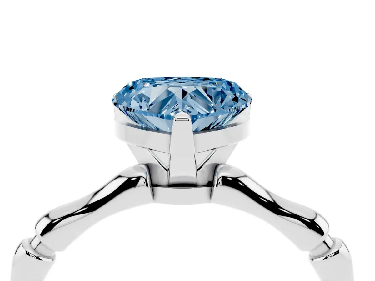 Fancy Blue Heart Cut Solitaire Diamond Ring with Bamboo Band and Four-Prong Setting Silver
