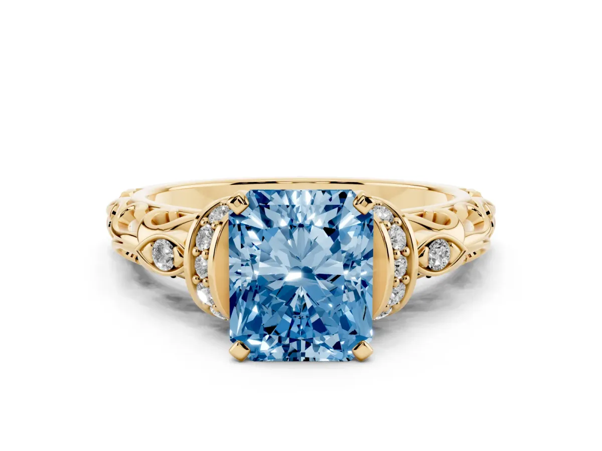 Fancy Blue Radiant Cut Diamond Solitaire Ring with Filigree Band and Four-Prong Setting Yellow gold