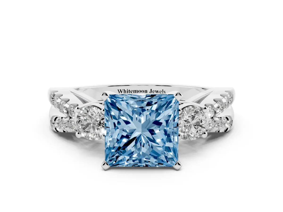 Fancy Blue Princess Cut Diamond Three-Stone Ring with Pavé Split Shank and Four-Prong Setting Silver