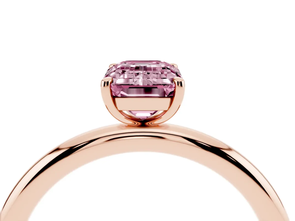 Fancy Pink Emerald Cut Solitaire Diamond Ring with Four-Prong Setting on a Plain Band Rose gold