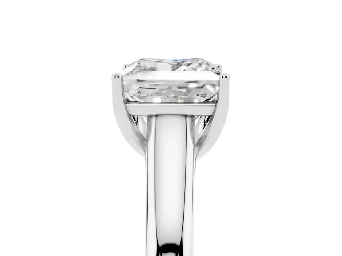 Princess Cut Solitaire Engagement Ring with Tapered Band and Four-Prong Setting Silver