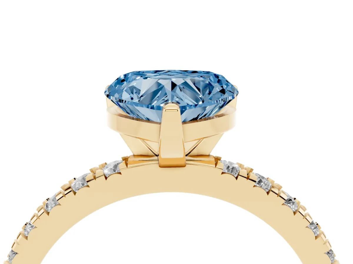 Fancy Blue Heart Cut Diamond Pavé Band Solitaire with Four-Prong Setting Yellow gold