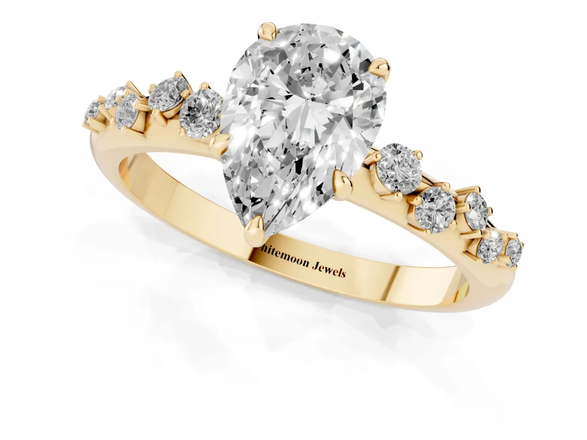 Pear Cut Diamond Cluster Prong-Set Solitaire Ring Yellow gold