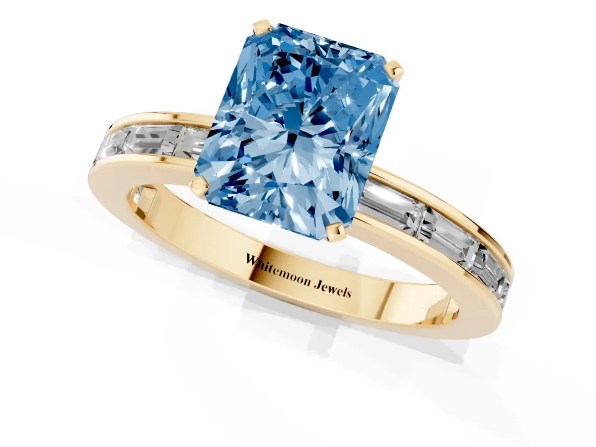 Fancy Blue Radiant Cut Solitaire Diamond Ring with Channel-Set Baguette Band and Four-Prong Setting Yellow gold