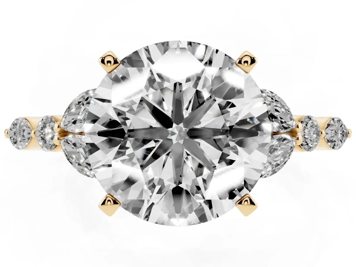 Round Cut Diamond Solitaire Ring with Side Stones and Four-Prong Setting Yellow gold
